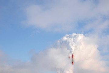 Smoke over the industrial complex. Environmentally friendly production.