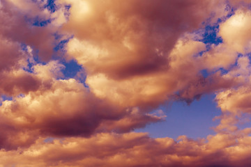 Naklejka na ściany i meble in the sky clouds of purple and blue