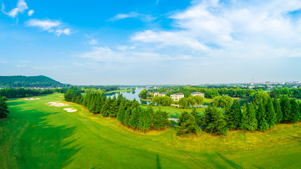Fototapeta na wymiar Aerial view of a beautiful green golf course in Shanghai,panoramic view.