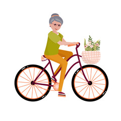 Senior woman on the bicycle. Elderly activity. Old Lady goes to sport, cycles. Elegant person is sitting on the bicycle with flowers. Healthy activity lifestyle for retiree.