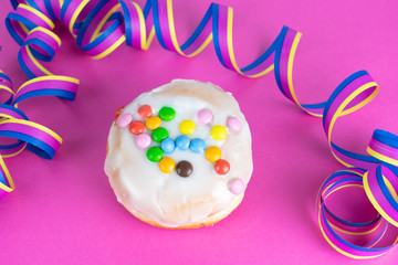 Delicious birthday cake with pink background and copy space
