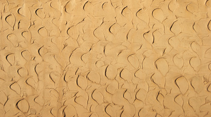 Beige clay plaster walls. Background texture.