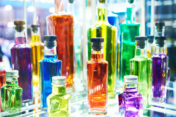Glass bottles with colored liquids