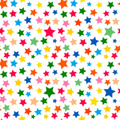 Seamless vector background with colorful stars. Various sizes of stars on white. Childish background.