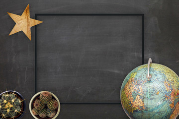 Flat lay top view World travel concept with chalk background and black frame