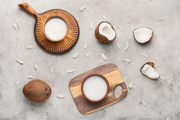 Composition with different coconut products on light background