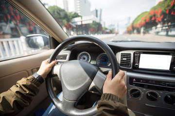 Driving car on city street