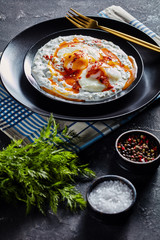 cilbir, poached eggs in dill yogurt sauce