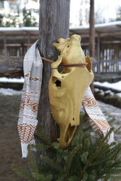 Traditional national ancient Slavic holiday Veles God Day in Russia, Moscow region. Russian, belarusian, ukrainian folk style. Ceremony in pagan temple with ritual skulls, "rushnik" (embroidery towel)