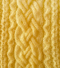 Knitted homemade fabric texture. Knitted background pattern. Modern knitwear fabric texture. Geometric decorative texture. Simple design background.