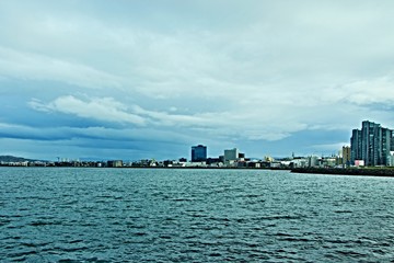 Fototapeta na wymiar Iceland-view of the sea coast and the city of Reykjavik