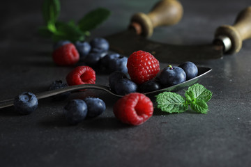 mystic light blueberries on dark background