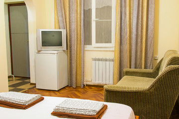 The interior of an ordinary room in an inexpensive hotel