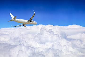 Fototapeta na wymiar Airplane flying at high altitude and beautiful high-altitude clouds in spring