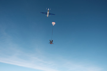 Skydiving. Tandem jump. Winter fun.