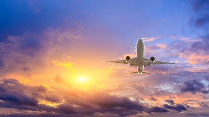 High-altitude airplane and beautiful sky at dusk