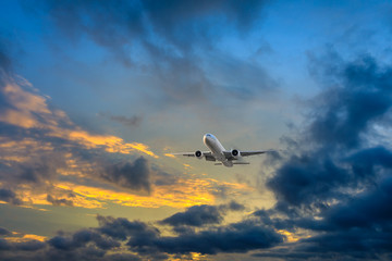 High-altitude airplane and beautiful sky at dusk