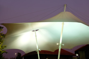 Canopy stretch tent in twilight sky. 