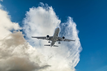 Fototapeta na wymiar High-altitude airplane and beautiful sky in spring