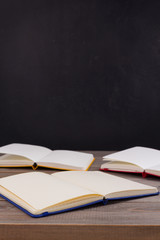notepad or paper notebook at wooden table