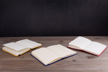notepad or paper notebook at wooden table
