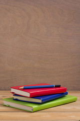 notepad or paper notebook at wooden table
