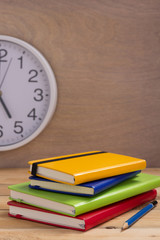 notepad or paper notebook at wooden table