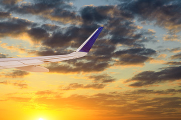 High-altitude airplane and beautiful sky at dusk