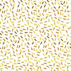 seamless pattern with confetti, sprinkles festive glitter. Brown yellow gold orange beige isolated on white background. Can be used for greeting card design, Gift wrap, fabrics, wallpapers. Vector