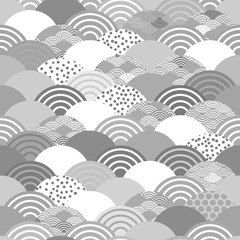 Seigaiha or seigainami literally means wave of the sea. seamless pattern abstract scales simple Spring Nature background with japanese circle Gray white colors. Vector