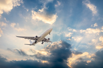 Fototapeta na wymiar High-altitude airplane and beautiful sky at dusk