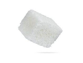 Piece of refined sugar isolated on a white background