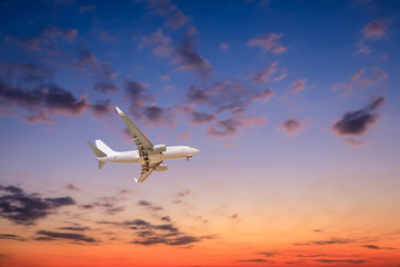High-altitude airplane and beautiful sky at dusk