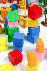 colorful of toys wood for kid playing on white background