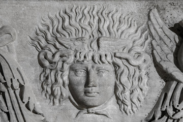 Medusa face sculpture. Head portrait of MedusaIn Greek mythology Medusa was a monster, a Gorgon, a winged human female with a hideous face and living venomous snakes in place of hair