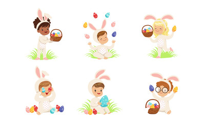 Fototapeta na wymiar Happy Easter, Collection of Cute Little Boys and Girls Dressed in Bunny Costumes Sitting on the Grass with Colorful Easter Eggs Vector Illustration