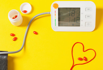 modern tonometer on yellow background