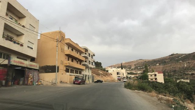 Amman, Jordan - View from the car window to the city streets part 4 4K