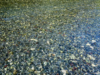 water, waves, light in water, refraction of light in water, light waves on the sandy bottom, sun glare in water