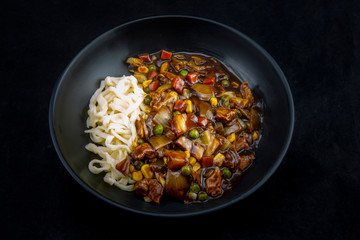 Jajangmyeon, noodle dish topped with black sauce
