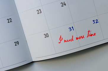 Closeup diary with date 31 and 32 added to the end of month and handwriting read I need more time,...