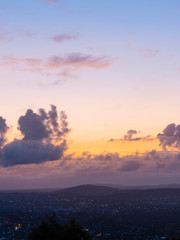 Dawn view of suburbs and mountain on the background at Brisbane, Australia.