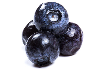 a handful of blueberries close-up isolated on white background