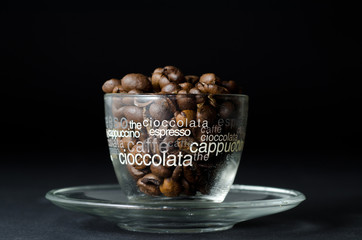 Glass Cup of Coffee with Coffee Beans.