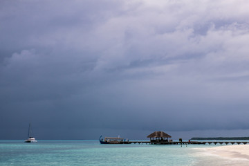 wooden pier over the sea in maldives