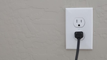 Plugging and Unplugging into an Electrical Outlet