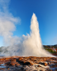 Powerful erupting of famous Strokkur geyser in southwestern Iceland, Europe.