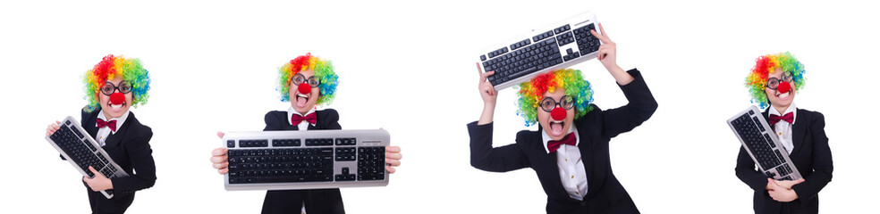 Funny clown with keyboard on white