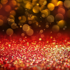 Abstract red background with golden bokeh