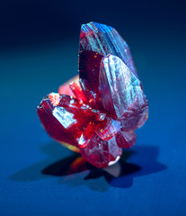 Precious red mineral on black